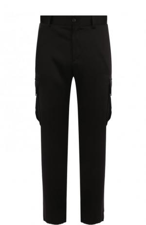 Шелковые брюки-карго Versace. Цвет: черный