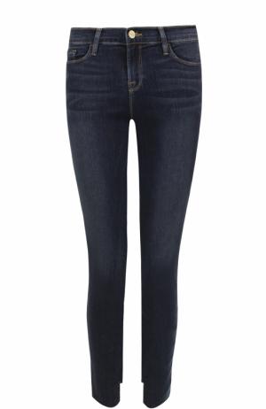 Укороченные джинсы-скинни с потертостями Frame Denim. Цвет: синий