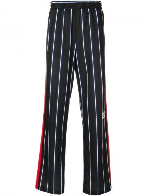 Полосатые спортивные брюки MSGM. Цвет: синий