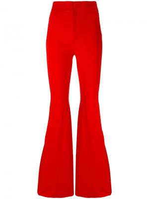 Расклешенные брюки Givenchy. Цвет: красный