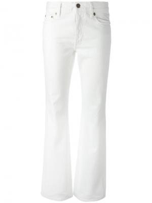 Укороченные расклешенные джинсы Saint Laurent. Цвет: белый