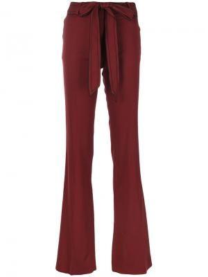 Расклешенные брюки с поясом Victoria Beckham. Цвет: красный