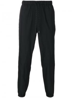 Спортивные брюки Issey Miyake. Цвет: синий