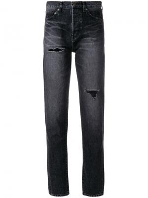 Зауженные джинсы с потертой отделкой Saint Laurent. Цвет: чёрный