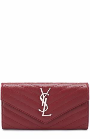 Кожаный кошелек с клапаном и логотипом бренда Saint Laurent. Цвет: красный