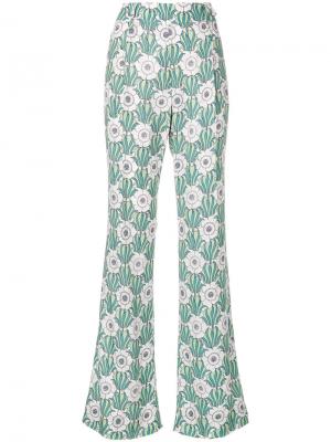 Расклешенные брюки с цветочным принтом Prada. Цвет: зелёный