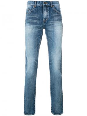 Классические джинсы узкого кроя Saint Laurent. Цвет: синий