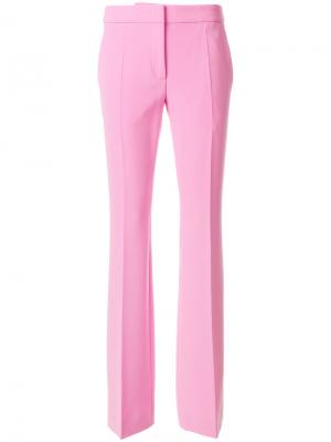 Расклешенные брюки слим Moschino. Цвет: розовый и фиолетовый