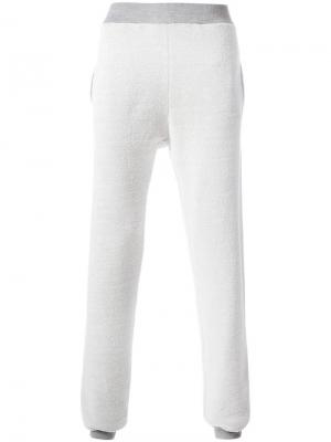 Спортивные брюки с эффектом вывернутых наизнанку Maison Margiela. Цвет: серый