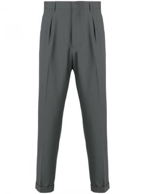 Зауженные брюки Prada. Цвет: серый